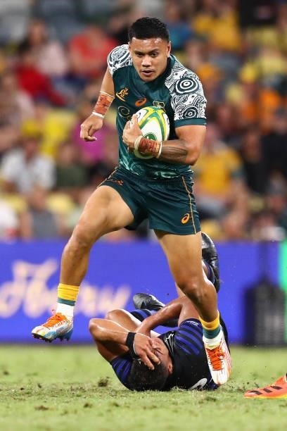 Len Ikitau of the Wallabies makes a break during The Rugby Championship match between the Australian Wallabies and Argentina Pumas at QCB Stadium on...