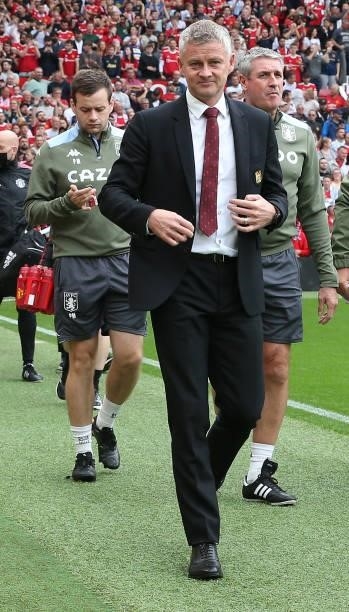 Manager Ole Gunnar Solskjaer of Manchester United walks out ahead of the Premier League match between Manchester United and Aston Villa at Old...
