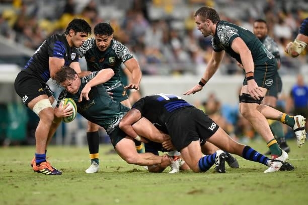 Michael Hooper of the Wallabies is tackled during The Rugby Championship match between the Australian Wallabies and Argentina Pumas at QCB Stadium on...