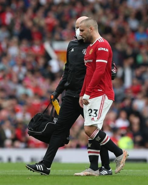 Luke Shaw of Manchester United leaves the match with an injury during the Premier League match between Manchester United and Aston Villa at Old...