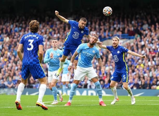 Mateo Kovacic of Chelsea beats Kyle Walker of Manchester City to the header during the Premier League match between Chelsea and Manchester City at...