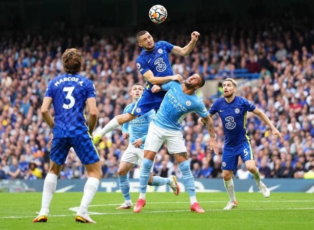 Mateo Kovacic of Chelsea beats Kyle Walker of Manchester City to the header during the Premier League match between Chelsea and Manchester City at...