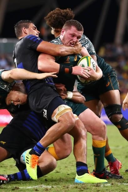 Angus Bell of the Wallabies is tackled during The Rugby Championship match between the Australian Wallabies and Argentina Pumas at QCB Stadium on...