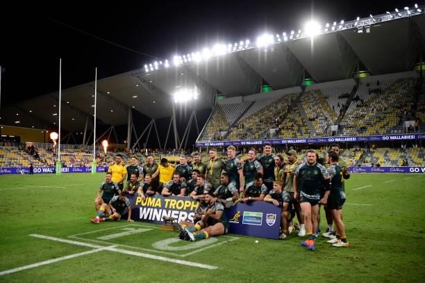 The Wallabies pose together after winning The Rugby Championship match between the Australian Wallabies and Argentina Pumas at QCB Stadium on...