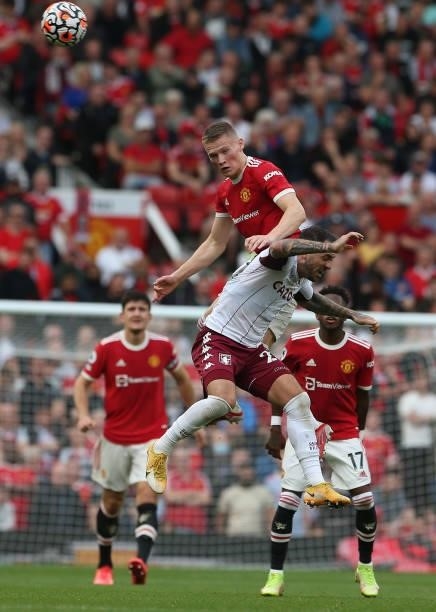 Scott McTominay of Manchester United in action with Danny Ings of Aston Villa during the Premier League match between Manchester United and Aston...
