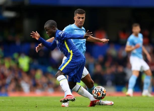 Ngolo Kante of Chelsea with Rodrigo of Manchester City during the Premier League match between Chelsea and Manchester City at Stamford Bridge on...