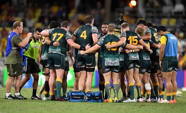 The Wallabies gather in a huddle during The Rugby Championship match between the Australian Wallabies and Argentina Pumas at QCB Stadium on September...