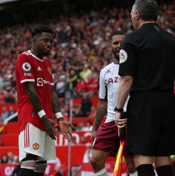 Fred of Manchester United appeals to the referee's assistant during the Premier League match between Manchester United and Aston Villa at Old...