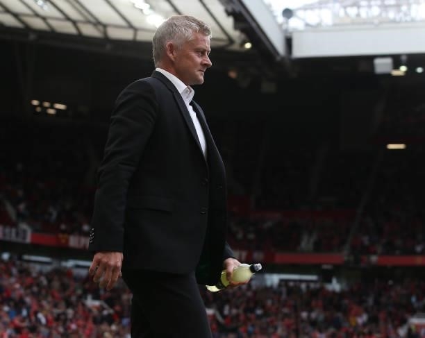 Manager Ole Gunnar Solskjaer of Manchester United walks out ahead of the second half of the Premier League match between Manchester United and Aston...