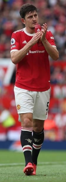 Harry Maguire of Manchester United leaves the match with an injury during the Premier League match between Manchester United and Aston Villa at Old...