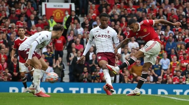 Mason Greenwood Manchester United has a shot on goal during the Premier League match between Manchester United and Aston Villa at Old Trafford on...