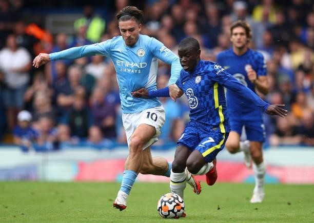 Ngolo Kante of Chelsea battles for possession with Jack Grealish of Manchester City during the Premier League match between Chelsea and Manchester...