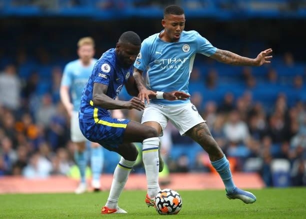 Antonio Ruediger of Chelsea battles for possession with Gabriel Jesus of Manchester City during the Premier League match between Chelsea and...