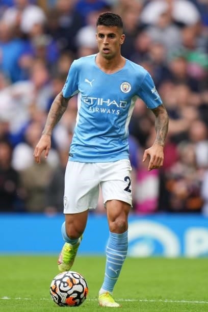 Joao Cancelo of Manchester City runs with the ball during the Premier League match between Chelsea and Manchester City at Stamford Bridge on...