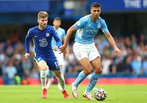 Rodrigo of Manchester City controls the ball under pressure of Timo Werner of Chelsea FC during the Premier League match between Chelsea and...