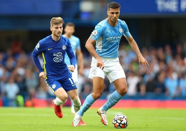 Rodrigo of Manchester City controls the ball under pressure of Timo Werner of Chelsea FC during the Premier League match between Chelsea and...