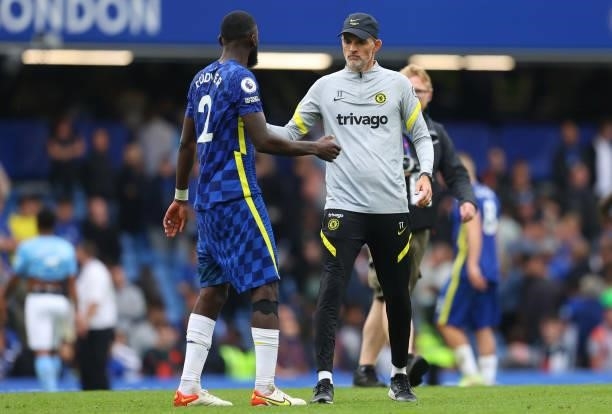 Thomas Tuchel, Manager of Chelsea interacts with Antonio Ruediger of Chelsea following the Premier League match between Chelsea and Manchester City...