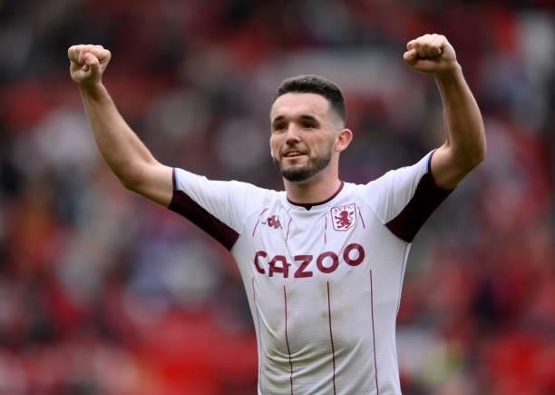 John McGinn of Aston Villa celebrates his sides win following the Premier League match between Manchester United and Aston Villa at Old Trafford on...