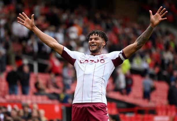 Tyrone Mings of Aston Villa celebrates their sides win following during the Premier League match between Manchester United and Aston Villa at Old...