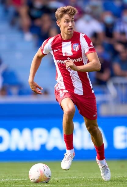 Marcos Llorente of Club Atletico de Madrid runs with the ball during the La Liga Santander match between Deportivo Alaves and Club Atletico de Madrid...