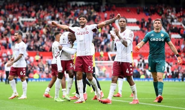 Tyrone Mings of Aston Villa celebrates his sides win following the Premier League match between Manchester United and Aston Villa at Old Trafford on...