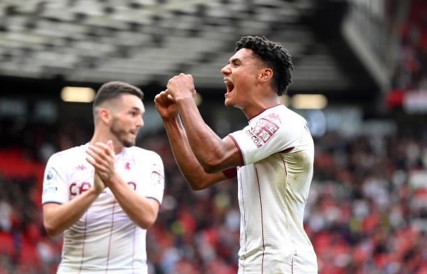 Ollie Watkins of Aston Villa celebrates his sides win following the Premier League match between Manchester United and Aston Villa at Old Trafford on...