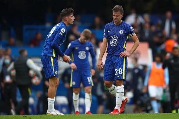 Kai Havertz and Cesar Azpilicueta of Chelsea look dejected following their team's defeat in the Premier League match between Chelsea and Manchester...