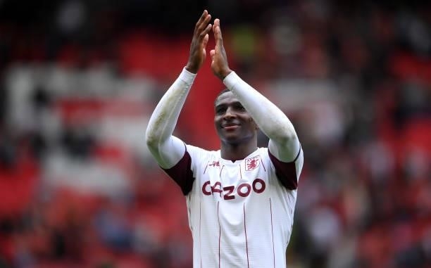 Kortney Hause of Aston Villa claps the fans following the Premier League match between Manchester United and Aston Villa at Old Trafford on September...