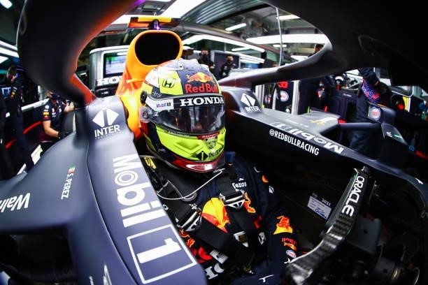 Sergio Perez of Mexico and Red Bull Racing prepares to drive in the garage during qualifying ahead of the F1 Grand Prix of Russia at Sochi Autodrom...