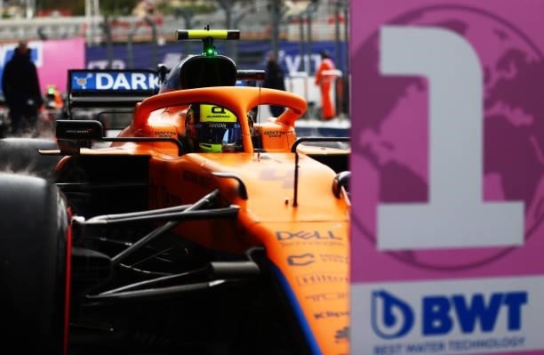 Pole position qualifier Lando Norris of Great Britain and McLaren F1 stops in parc ferme during qualifying ahead of the F1 Grand Prix of Russia at...