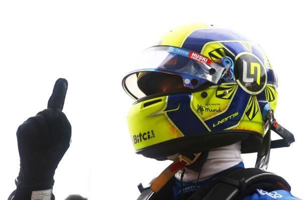 Pole position qualifier Lando Norris of Great Britain and McLaren F1 celebrates in parc ferme during qualifying ahead of the F1 Grand Prix of Russia...