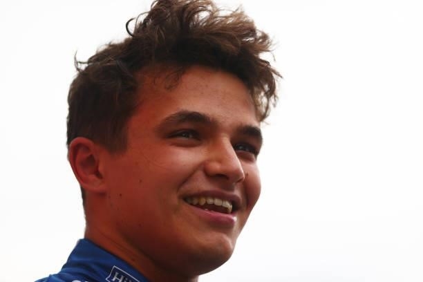 Pole position qualifier Lando Norris of Great Britain and McLaren F1 celebrates in parc ferme during qualifying ahead of the F1 Grand Prix of Russia...