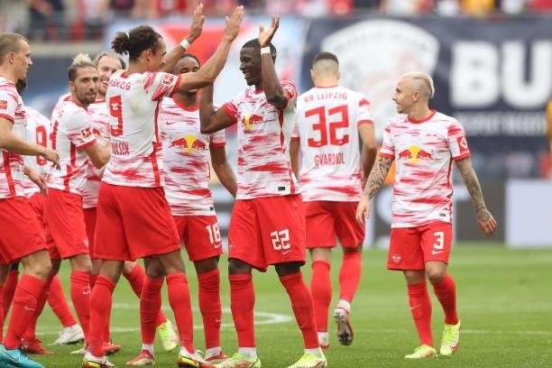 Nordi Mukiele of RB Leipzig celebrates after scoring their team's third goal with Emil Forsberg, Angelino and Amadou Haidara during the Bundesliga...
