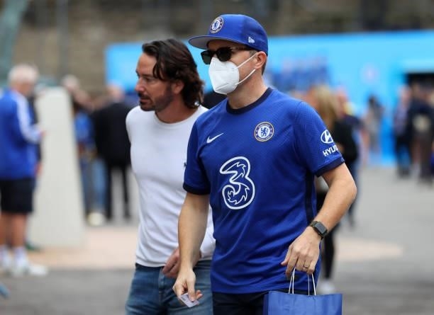 Chelsea fan wearing a facemask ahead of the Premier League match between Chelsea and Manchester City at Stamford Bridge on September 25, 2021 in...