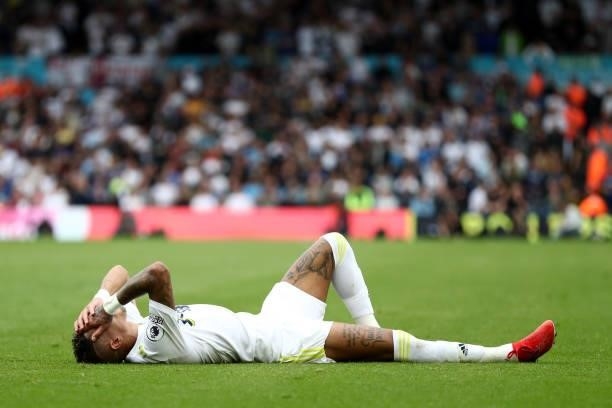 Raphinha of Leeds United reacts as he appears to be injured during the Premier League match between Leeds United and West Ham United at Elland Road...