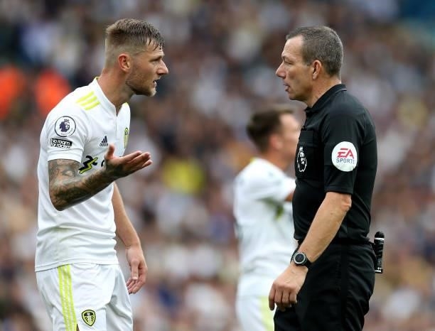 Liam Cooper of Leeds United complains to Referee, Kevin Friend during the Premier League match between Leeds United and West Ham United at Elland...