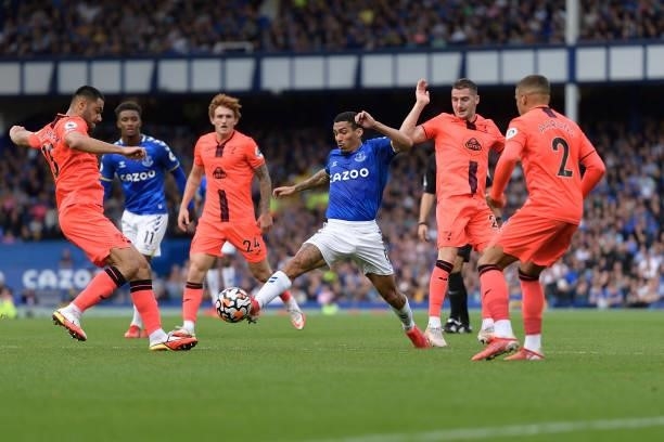 Allan of Everton challenges for the ball during the Premier League match between Everton and Norwich City at Goodison Park on September 25, 2021 in...