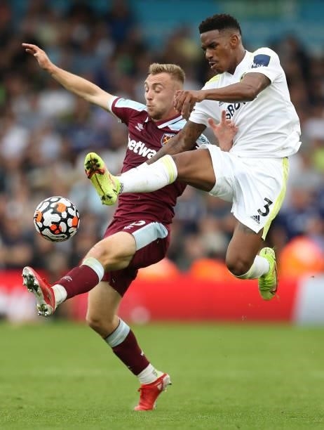 Junior Firpo of Leeds United battles for possession with Jarrod Bowen of West Ham United during the Premier League match between Leeds United and...