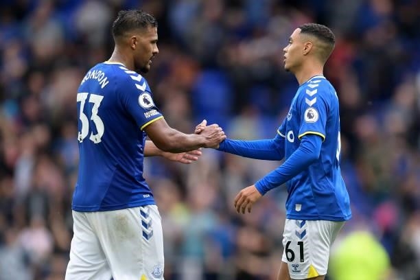 Solomon Rondon and Lewis Dobbin of Everton after the Premier League match between Everton and Norwich City at Goodison Park on September 25, 2021 in...