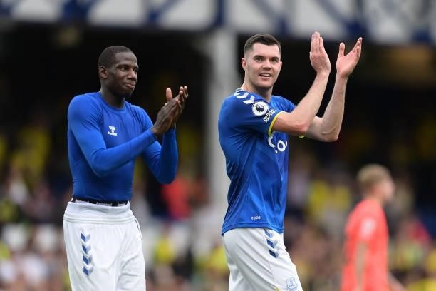 Abdoulaye Doucoure and Michael Keane of Everton after the Premier League match between Everton and Norwich City at Goodison Park on September 25,...