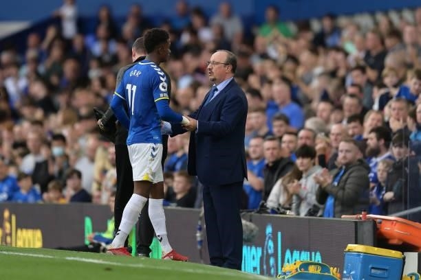 Demarai Gray and Rafael Benitez of Everton during the Premier League match between Everton and Norwich City at Goodison Park on September 25, 2021 in...