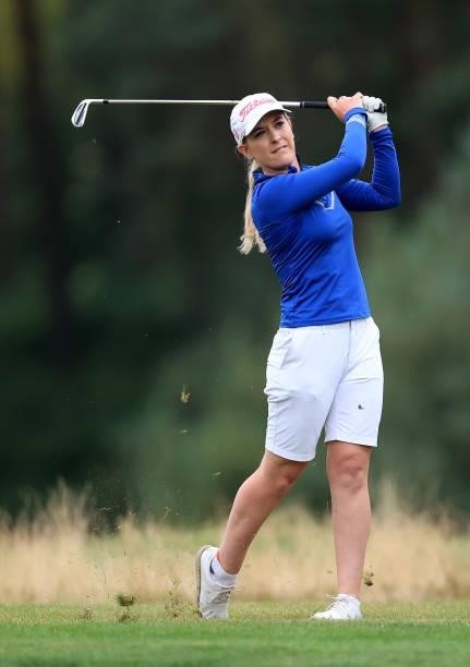 Lauren Taylor of England plays her second shot on the 18th hole during the Rose Ladies Series Final at Bearwood Lakes Golf Club on September 25, 2021...