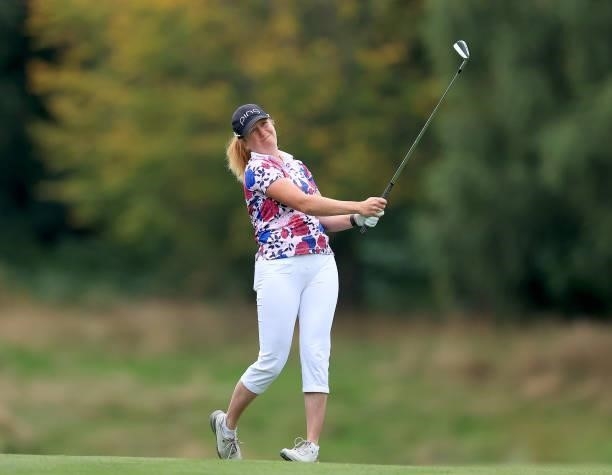 Hannah Burke of England plays her second shot on the 18th hole during the Rose Ladies Series Final at Bearwood Lakes Golf Club on September 25, 2021...