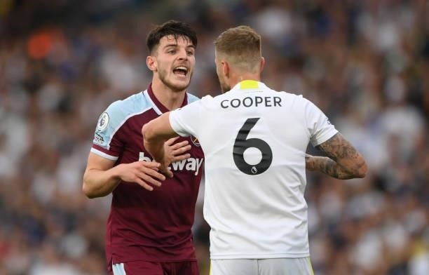 West Ham player Declan Rice has words with Liam Cooper during the Premier League match between Leeds United and West Ham United at Elland Road on...