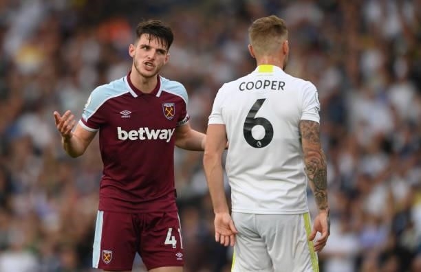 West Ham player Declan Rice has words with Liam Cooper during the Premier League match between Leeds United and West Ham United at Elland Road on...