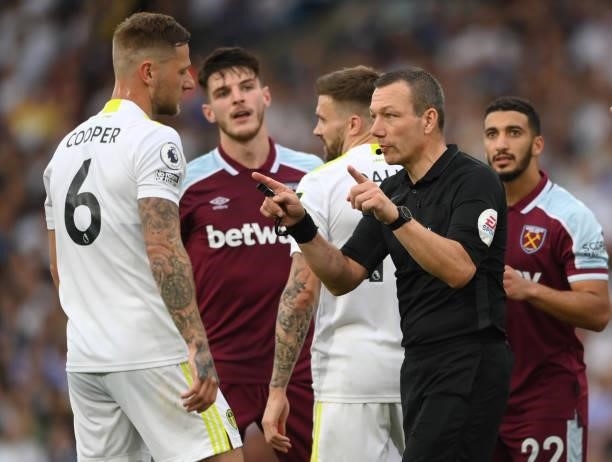 Referee Kevin Friend makes the VAR signal during the Premier League match between Leeds United and West Ham United at Elland Road on September 25,...