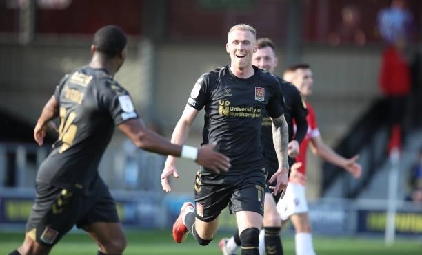 Mitch Pinnock of Northampton Town celebrates after scoring his sides second goal during the Sky Bet League Two match between Salford City and...