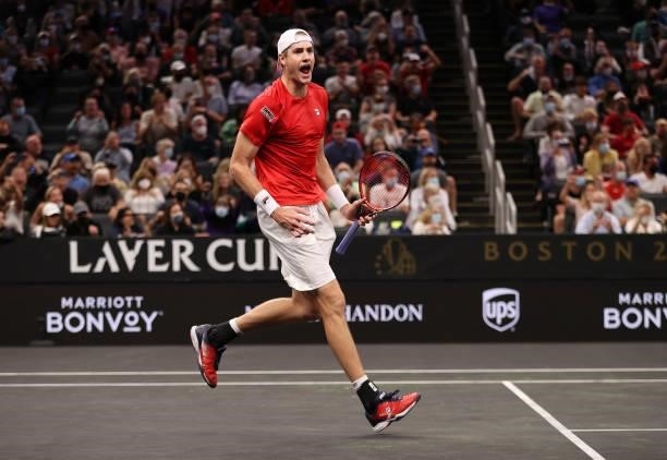 John Isner of Team World reacts to a shot against Alexander Zverev of Team Europe during the sixth match during Day 2 of the 2021 Laver Cup at TD...