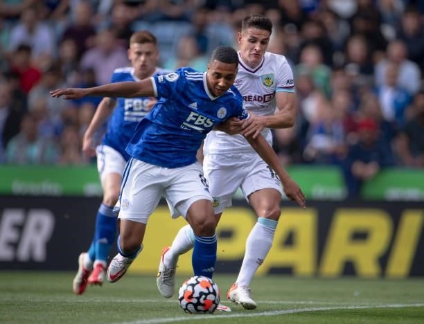 Youri Tielemans of Leicester City and Ashley Westwood of Burnley in action during the Premier League match between Leicester City and Burnley at The...