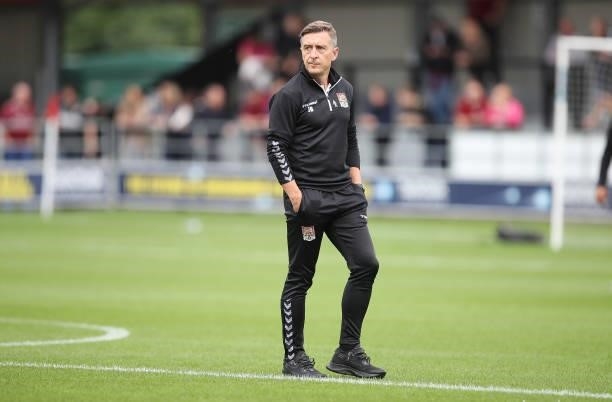 Northampton Town manager Jon Brady looks on prior to the Sky Bet League Two match between Salford City and Northampton Town at Peninsula Stadium on...